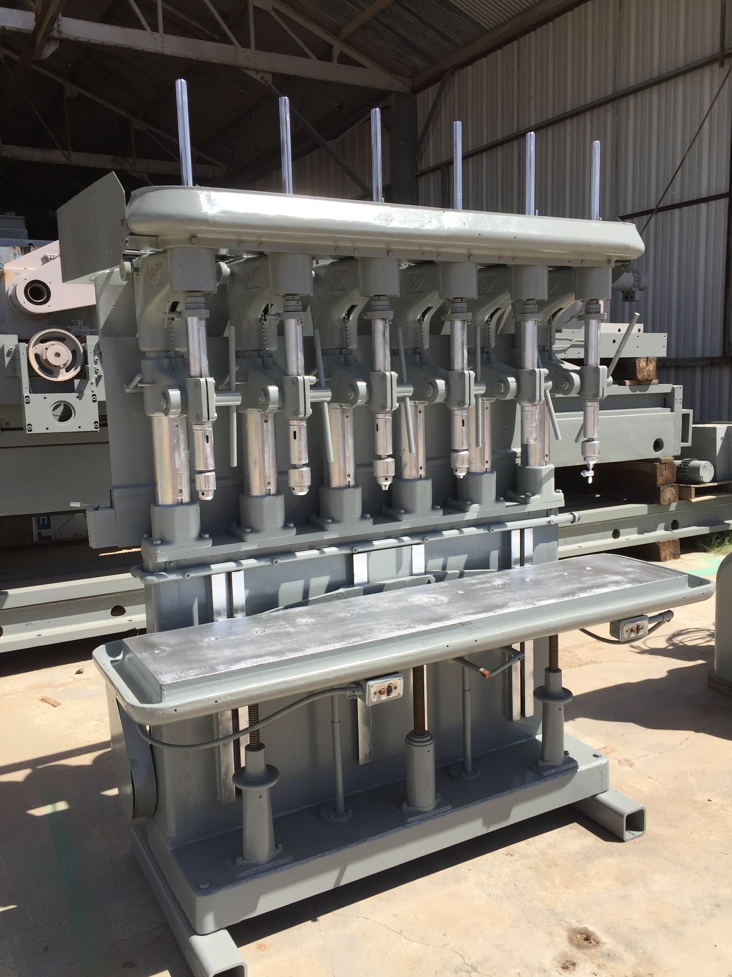 Used 6 Spindle Buffalo Production Drill; #2 MT; 14” x 66” Tbl;