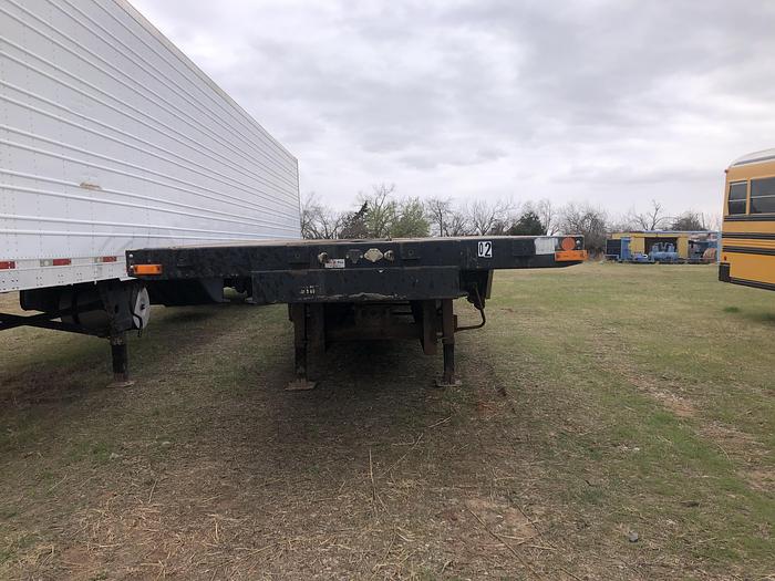 Used 2004 Transcraft 53 ft step deck trailer