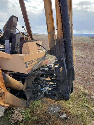 Used Case 580SE Backhoe w/ Attachments