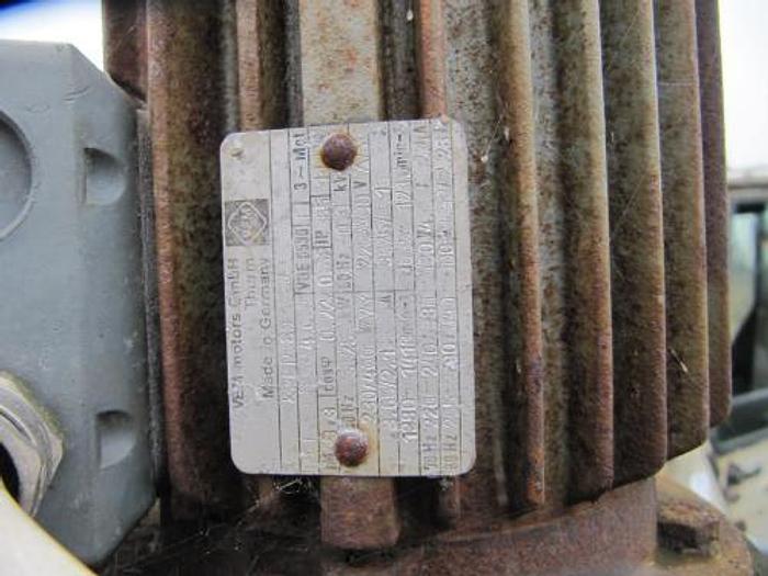 Used 1500 liter stainless steel tank with open top.