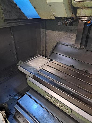 Used VERTIKALT BEARBEJDNKJNGSCENTER FABR. OKUMA, MODEL MC-4VA