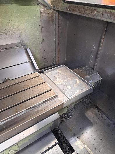 Used VERTIKALT BEARBEJDNKJNGSCENTER FABR. OKUMA, MODEL MC-4VA