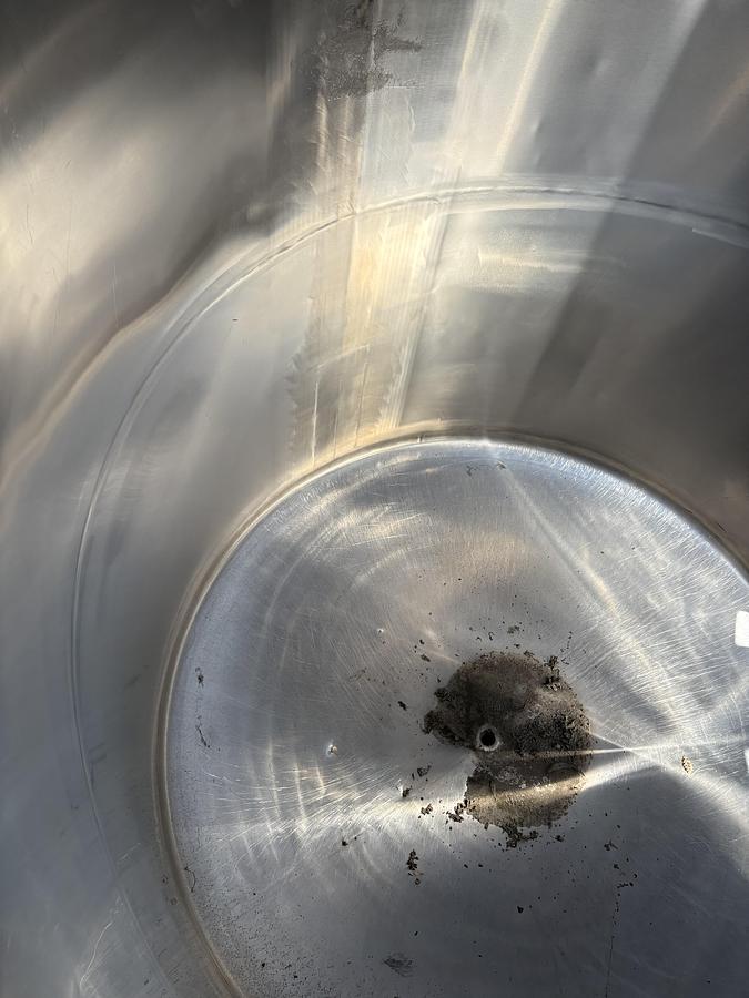 Used 1,200 Gallon Vertical Stainless Steel Tank