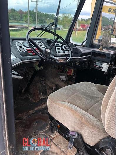 Used Item 0950 : John Deere 400C Off Road Dump Truck