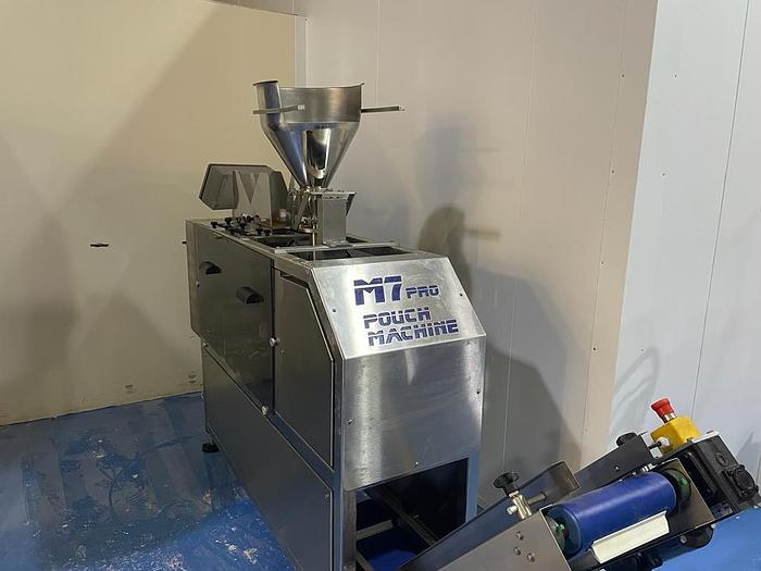 Used POUCH PACKING MACHINE