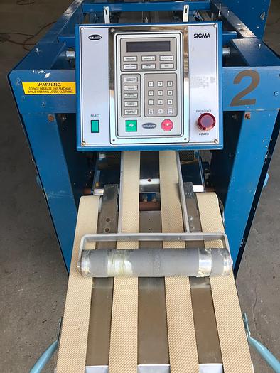 Used 2006 BRAUN REAR DISCHARGE TOWEL/GOWN FOLDER