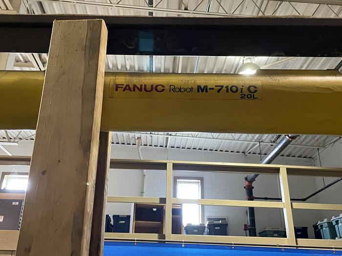 Used LINCOLN SYSTEM 55 WITH FANUC M710iC/20L TORCH CUTTING CELL WITH DUAL ROLL IN ROLL OUT TABLES
