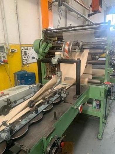 Used W&H TRIUMPH 3A with 2 col. in line flexo servo (+ system for TNT vacuum bags)