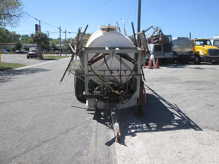 Used 1000 Gallon Pull Behind Boom Sprayer