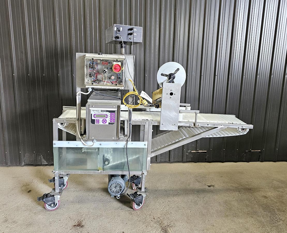 Used Used Fortress Phantom Metal Detector with Belt Conveyor and label applicator