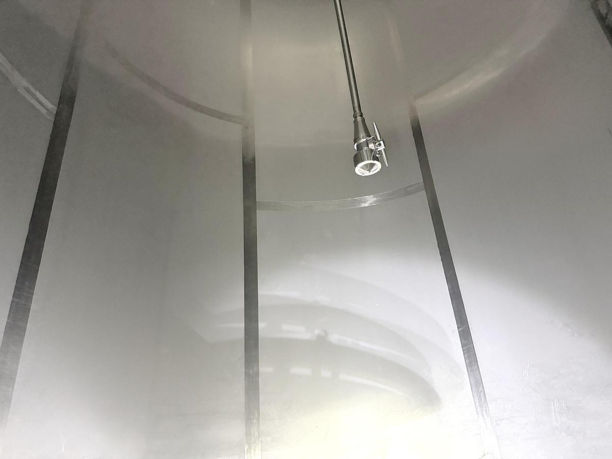 Used Used 13,208 Gallon Tank, 304 Stainless Steel, With Heat Exchanger & Pump