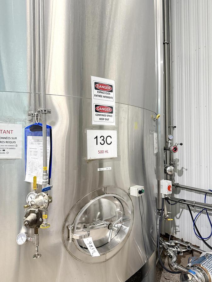 Used Used 13,208 Gallon Tank, 304 Stainless Steel, With Heat Exchanger & Pump