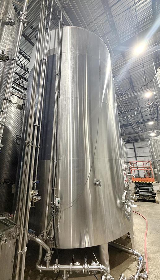 Used Used 13,208 Gallon Tank, 304 Stainless Steel, With Heat Exchanger & Pump