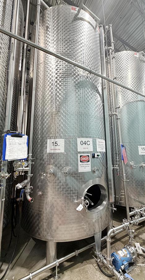 Used Used 2650 Gallon Jacketed Tank, 304 Stainless Steel, With Heat Exchanger & Pump