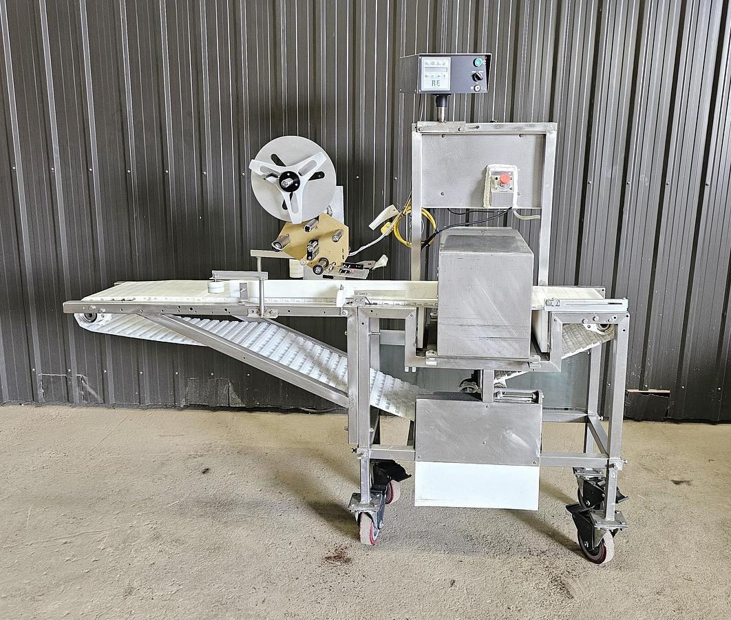 Used Used Fortress Phantom Metal Detector with Belt Conveyor and label applicator