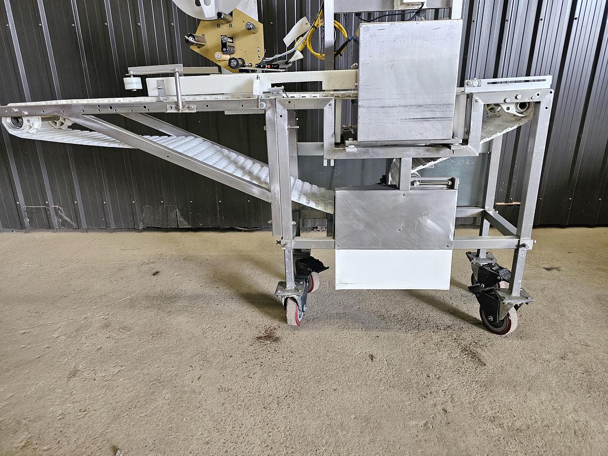 Used Used Fortress Phantom Metal Detector with Belt Conveyor and label applicator