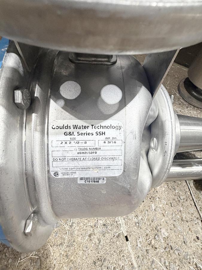 Used Used 13,208 Gallon Tank, 304 Stainless Steel, With Heat Exchanger & Pump