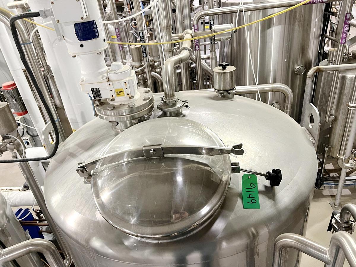 Used Used 600 Gallon Tank, 316L Stainless Steel, With Mixer & Pump