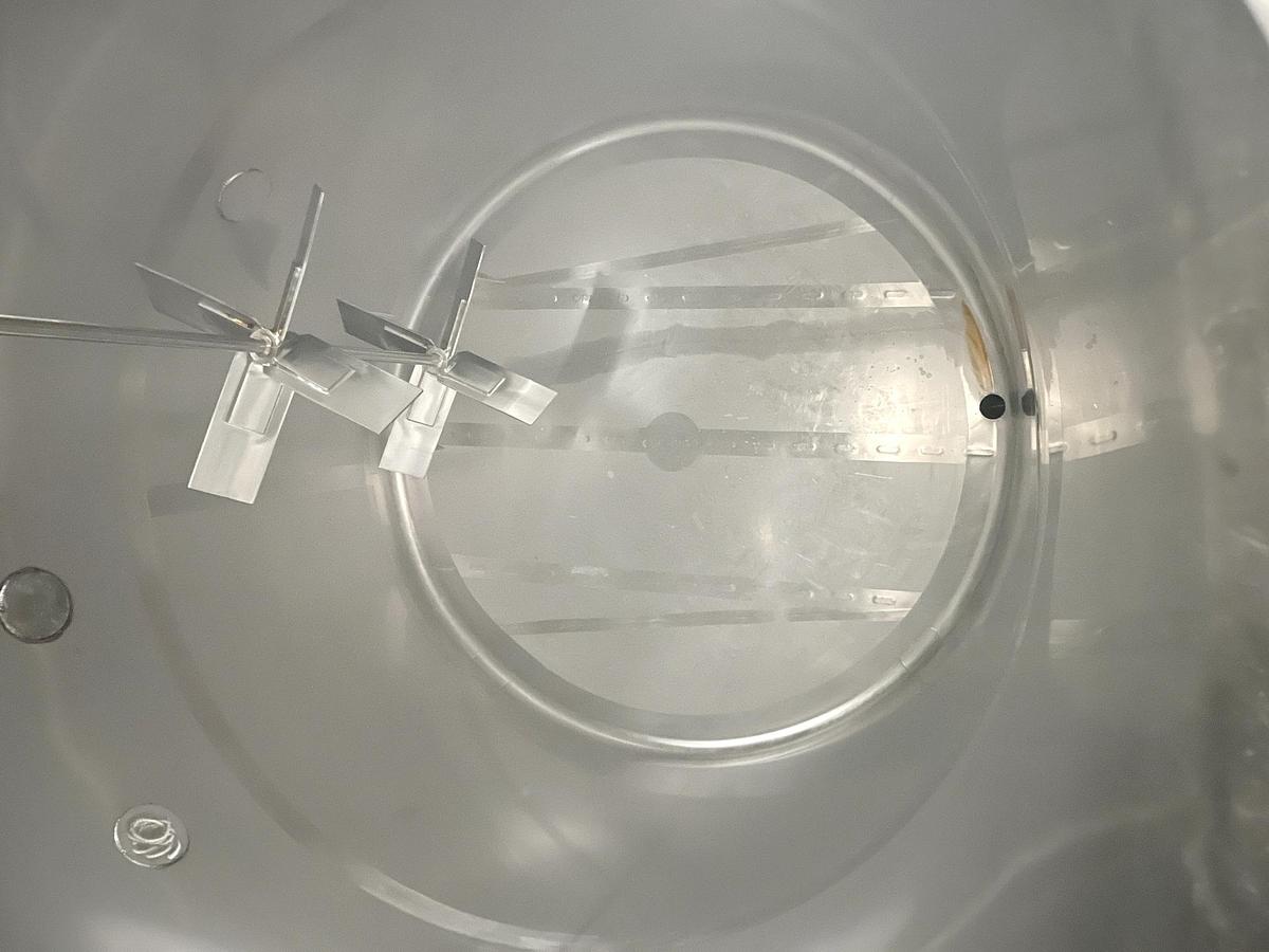 Used Used 2500 Gallon Tank, Stainless Steel, With Mixer & Pump