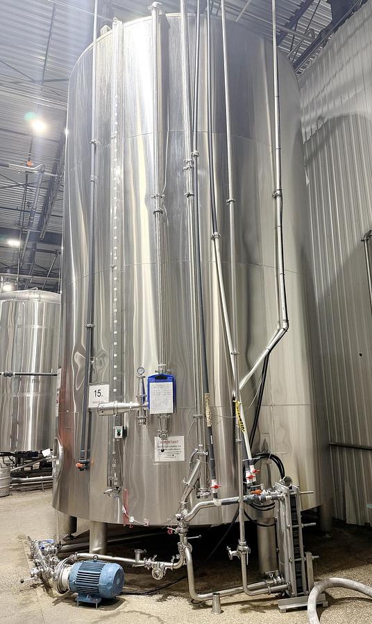 Used Used 13,208 Gallon Tank, 304 Stainless Steel, With Heat Exchanger & Pump