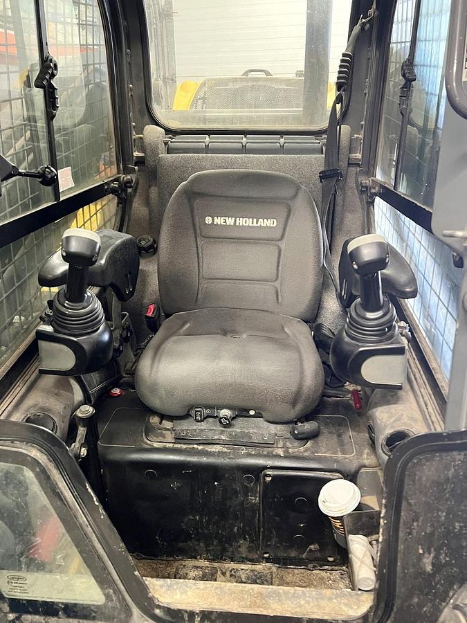 Used Used 2016 New Holland Compact Track Loader, Model C232 With Three Attachments