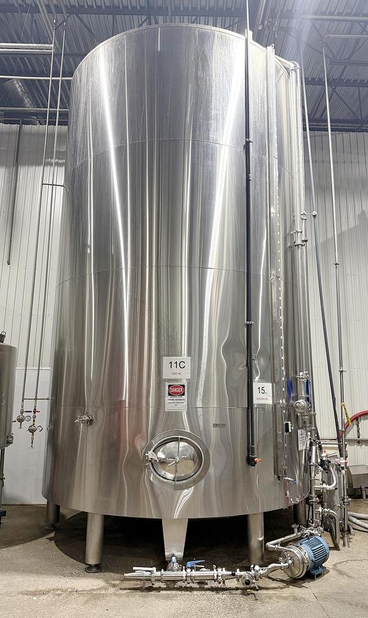 Used Used 13,208 Gallon Tank, 304 Stainless Steel, With Heat Exchanger & Pump