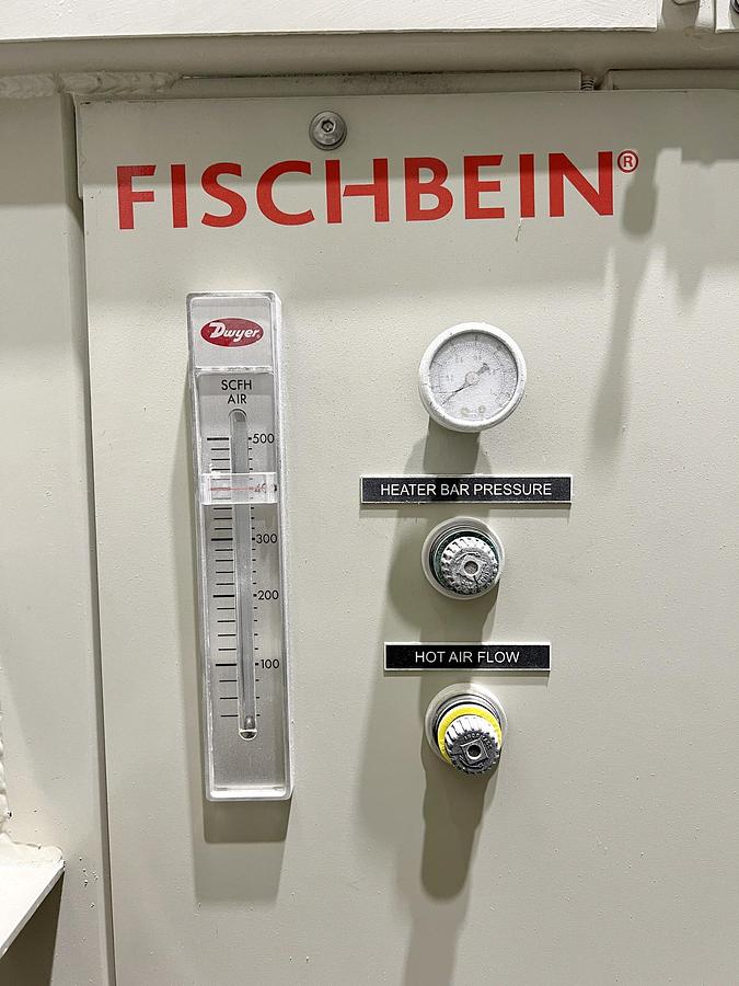 Used Used Fischbein Pinch Inner Liner Sealer, Model PILS 300, with Conveyor