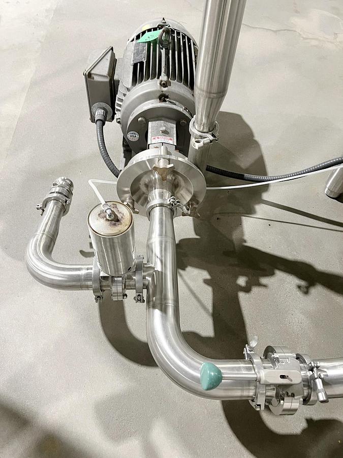 Used Used 2500 Gallon Tank, Stainless Steel, With Mixer & Pump