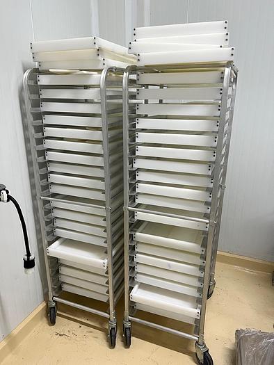Used LOT OF FOUR STAINLESS STEEL MOBILE RACKS WITH POLY TRAYS
