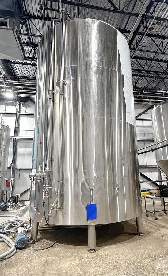 Used Used 13,208 Gallon Tank, 304 Stainless Steel, With Heat Exchanger & Pump