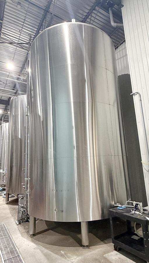 Used Used 13,208 Gallon Tank, 304 Stainless Steel, With Heat Exchanger & Pump