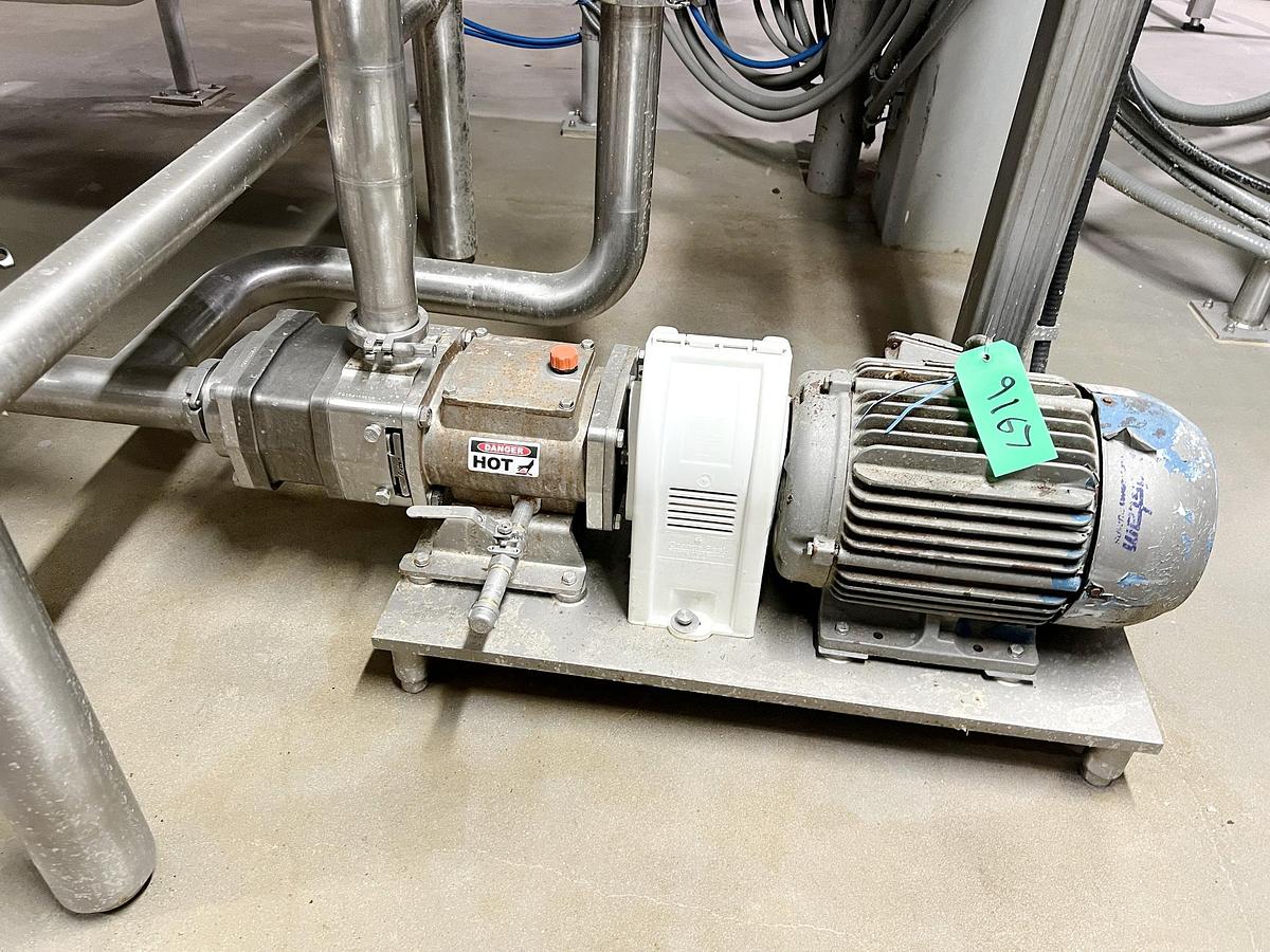 Used Used 1600 Gallon Jacketed Tank, Stainless Steel, With Scrape Agitation & Twin Screw Pump