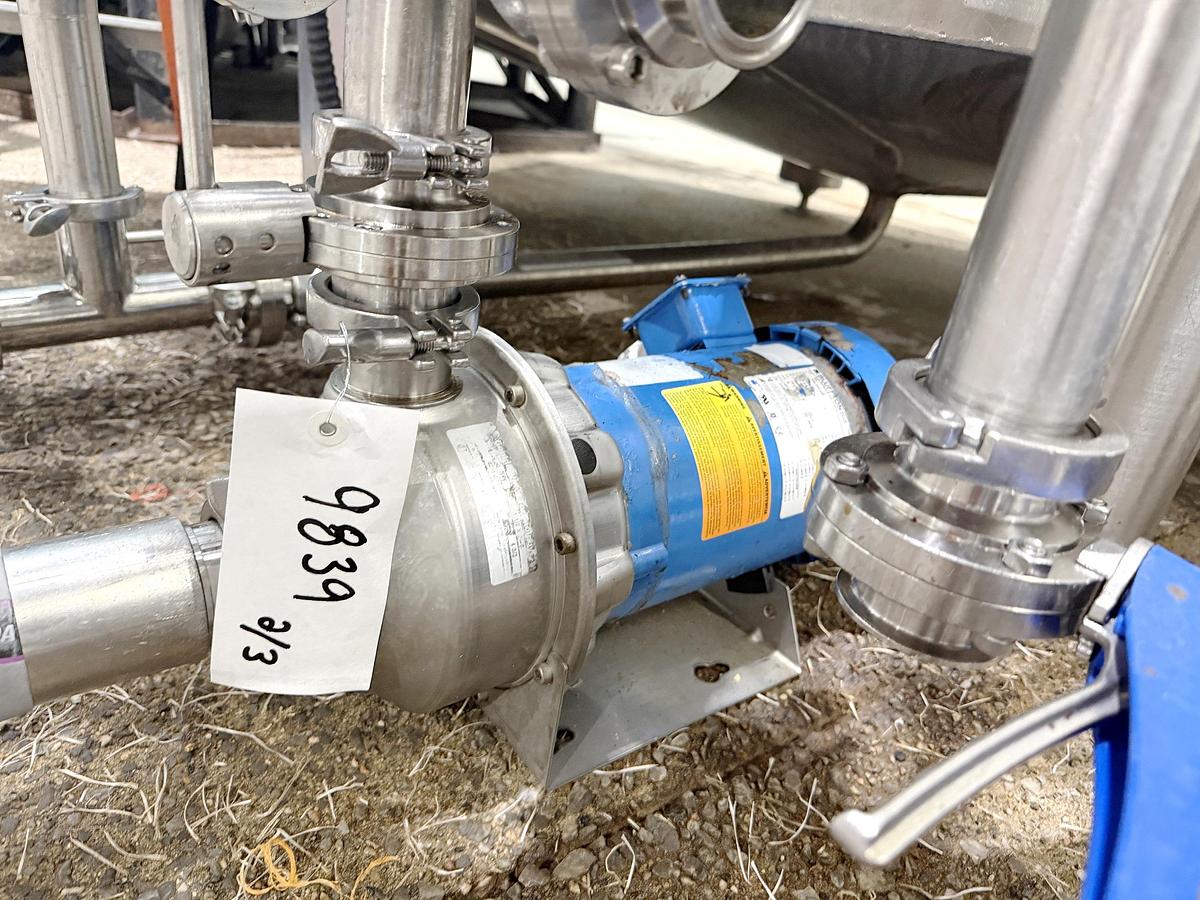 Used Used 2650 Gallon Jacketed Tank, 304 Stainless Steel, With Heat Exchanger & Pump