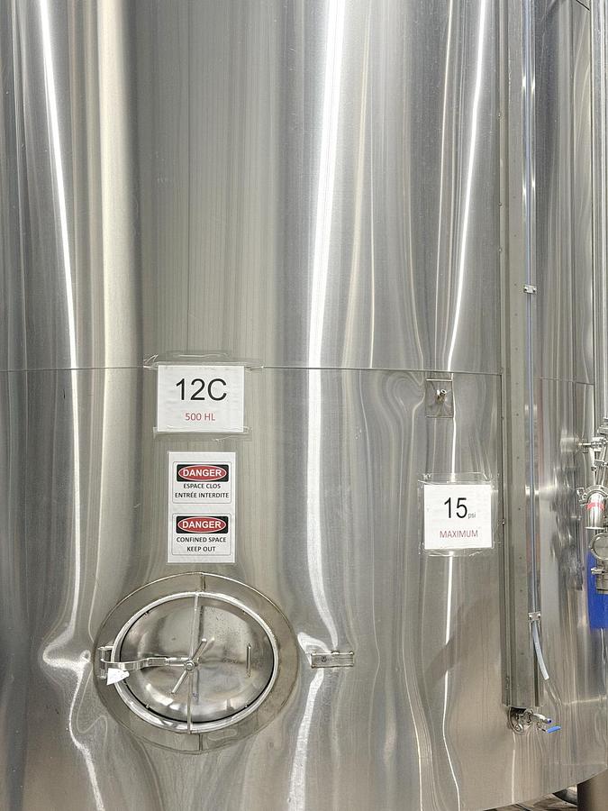 Used Used 13,208 Gallon Tank, 304 Stainless Steel, With Heat Exchanger & Pump