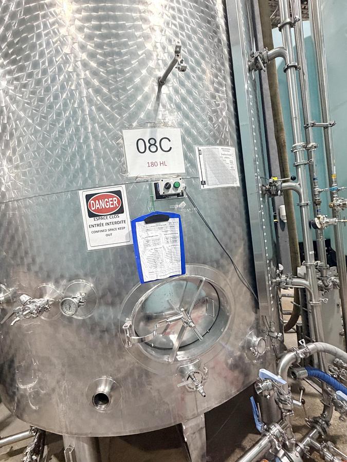 Used Used 5000 Gallon Tank, 304 Stainless Steel, With Heat Exchanger & Pump