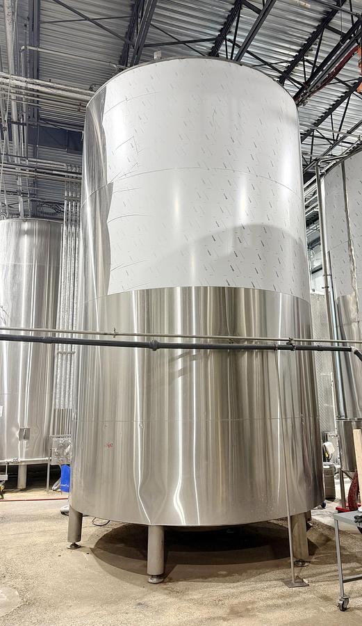 Used Used 13,208 Gallon Tank, 304 Stainless Steel, With Heat Exchanger & Pump