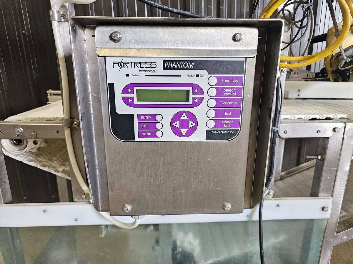 Used Used Fortress Phantom Metal Detector with Belt Conveyor and label applicator