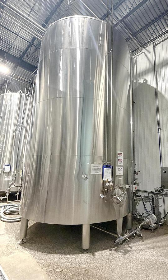Used Used 13,208 Gallon Tank, 304 Stainless Steel, With Heat Exchanger & Pump
