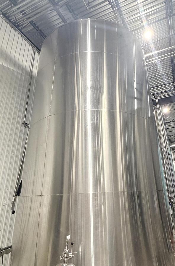 Used Used 13,208 Gallon Tank, 304 Stainless Steel, With Heat Exchanger & Pump