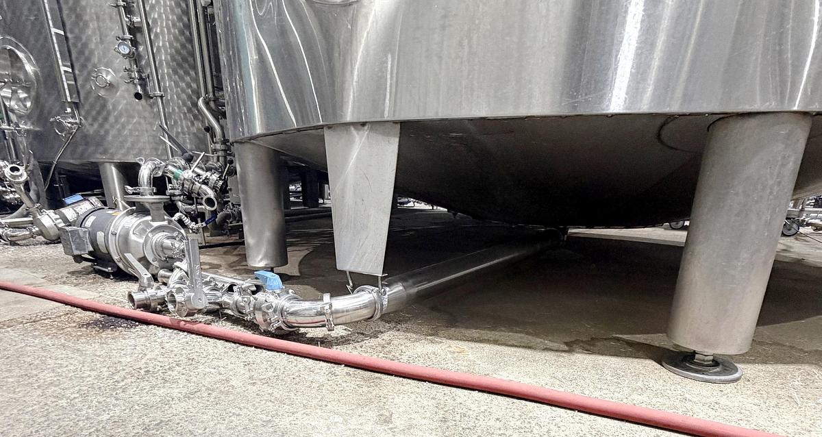 Used Used 13,208 Gallon Tank, 304 Stainless Steel, With Heat Exchanger & Pump