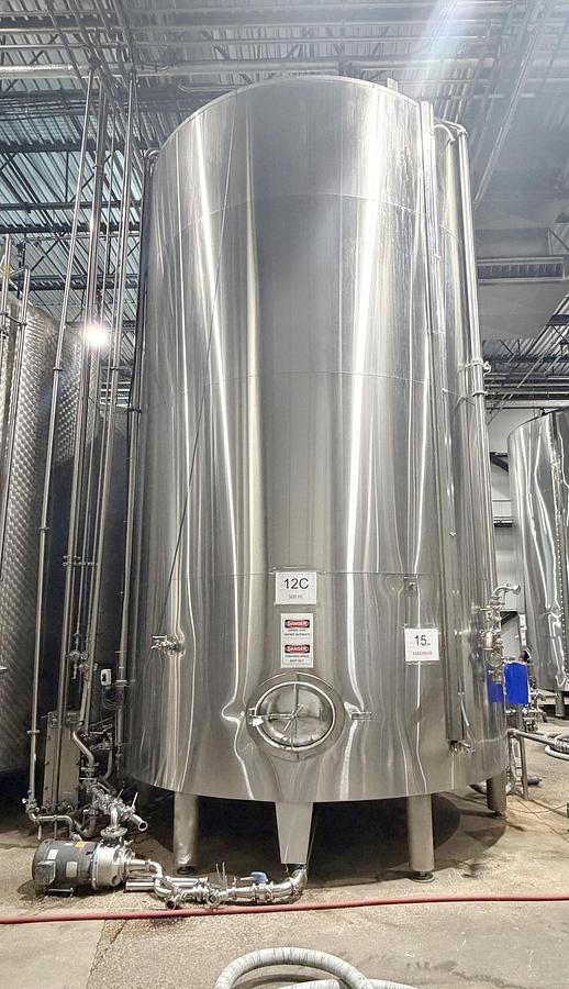 Used Used 13,208 Gallon Tank, 304 Stainless Steel, With Heat Exchanger & Pump