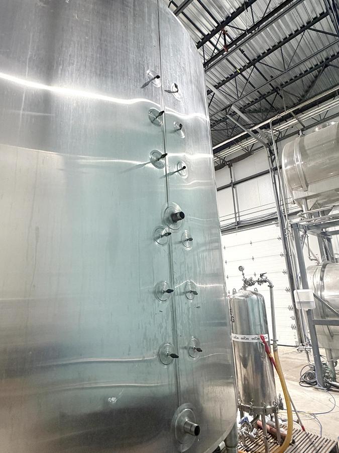 Used Used 5500 Gallon Jacketed Tank, 304 Stainless Steel, With Mixer