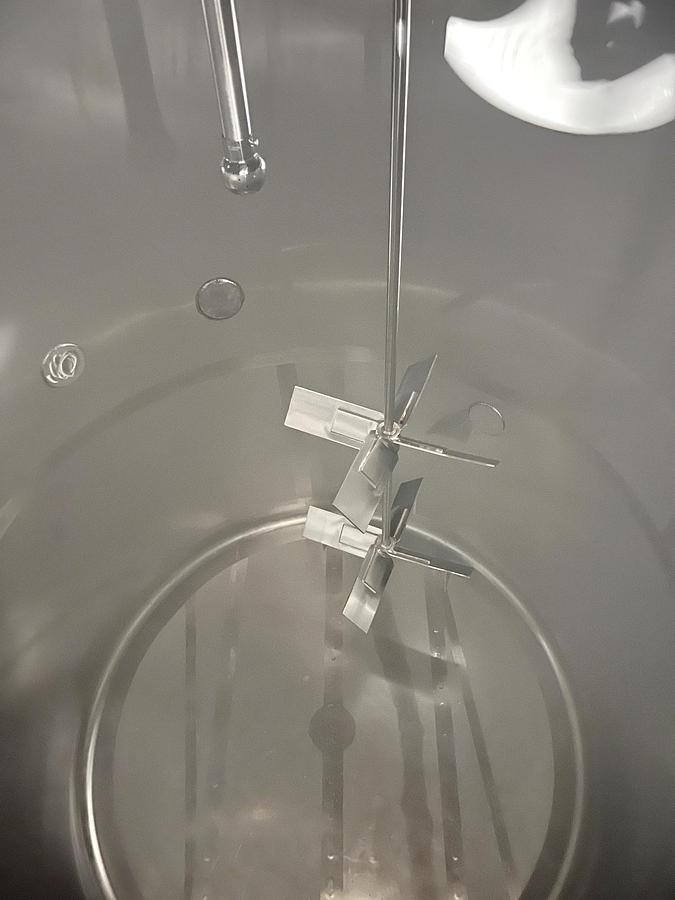 Used Used 2500 Gallon Tank, Stainless Steel, With Mixer & Pump