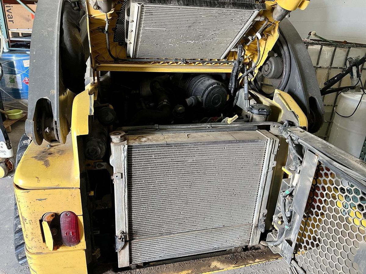 Used Used 2016 New Holland Compact Track Loader, Model C232 With Three Attachments