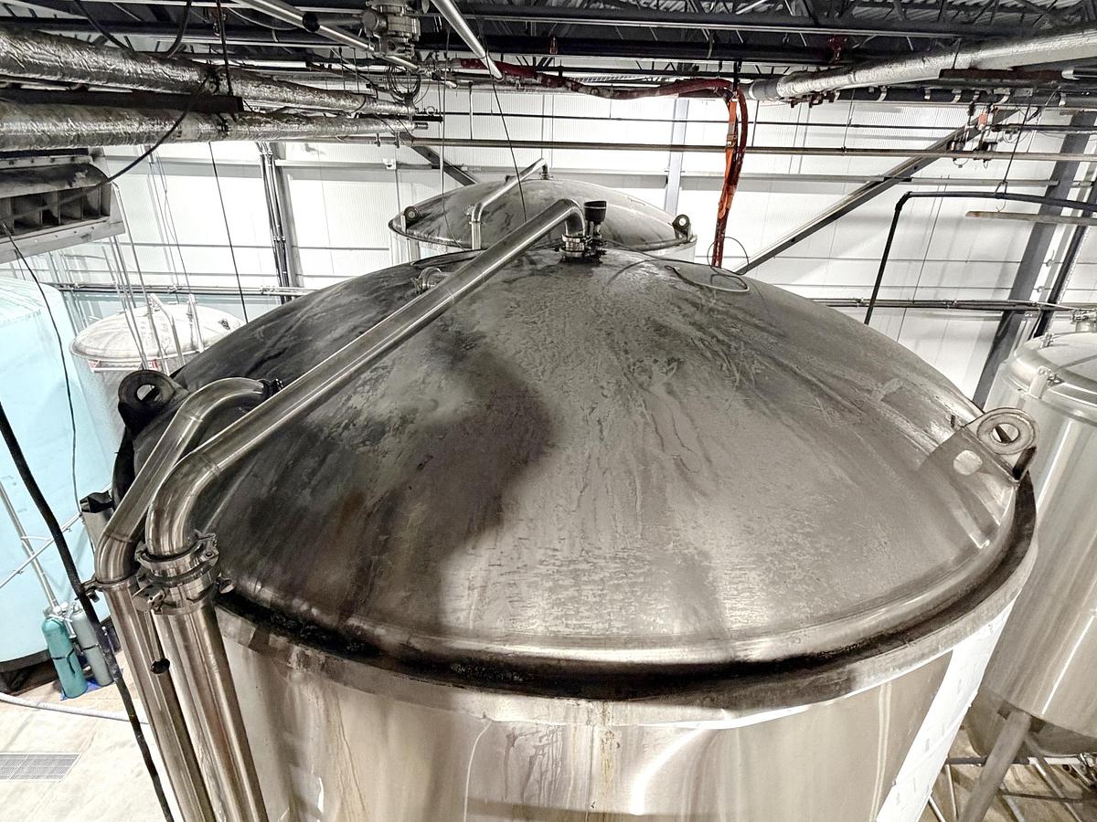 Used Used 13,208 Gallon Tank, 304 Stainless Steel, With Heat Exchanger & Pump