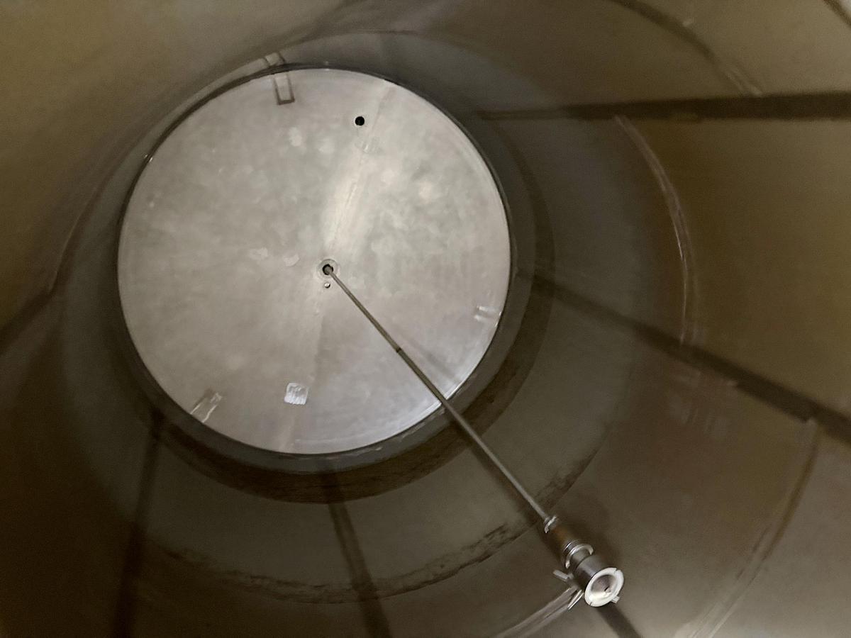 Used Used 13,208 Gallon Tank, 304 Stainless Steel, With Heat Exchanger & Pump