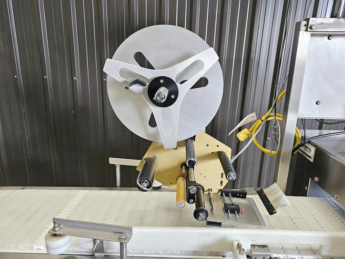 Used Used Fortress Phantom Metal Detector with Belt Conveyor and label applicator