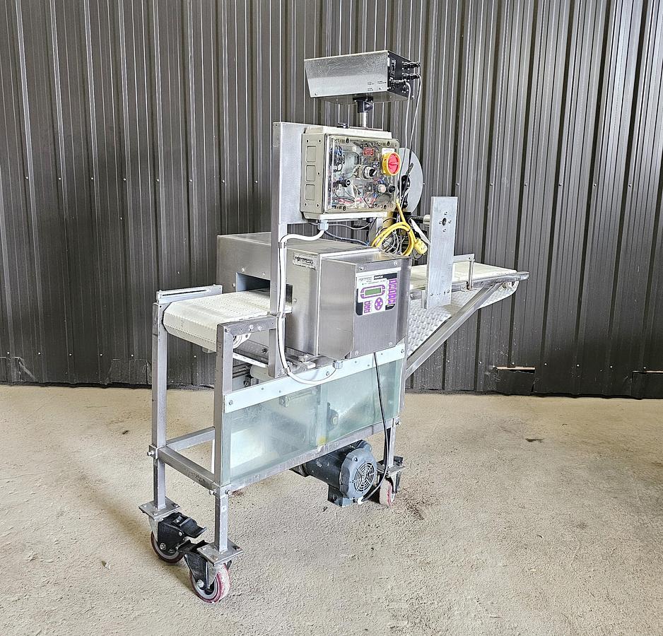 Used Used Fortress Phantom Metal Detector with Belt Conveyor and label applicator