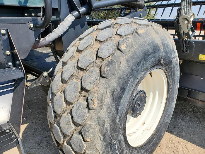 Used 16' Macdon M200 Rotary Windrower w/ 1400 Hours