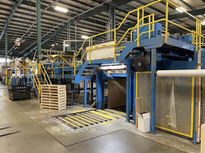 Used 65" JAGENBERG SYNCRO DUAL ROTARY KNIFE SHEETER W/ 4 SHAFTLESS UNWIND STANDS